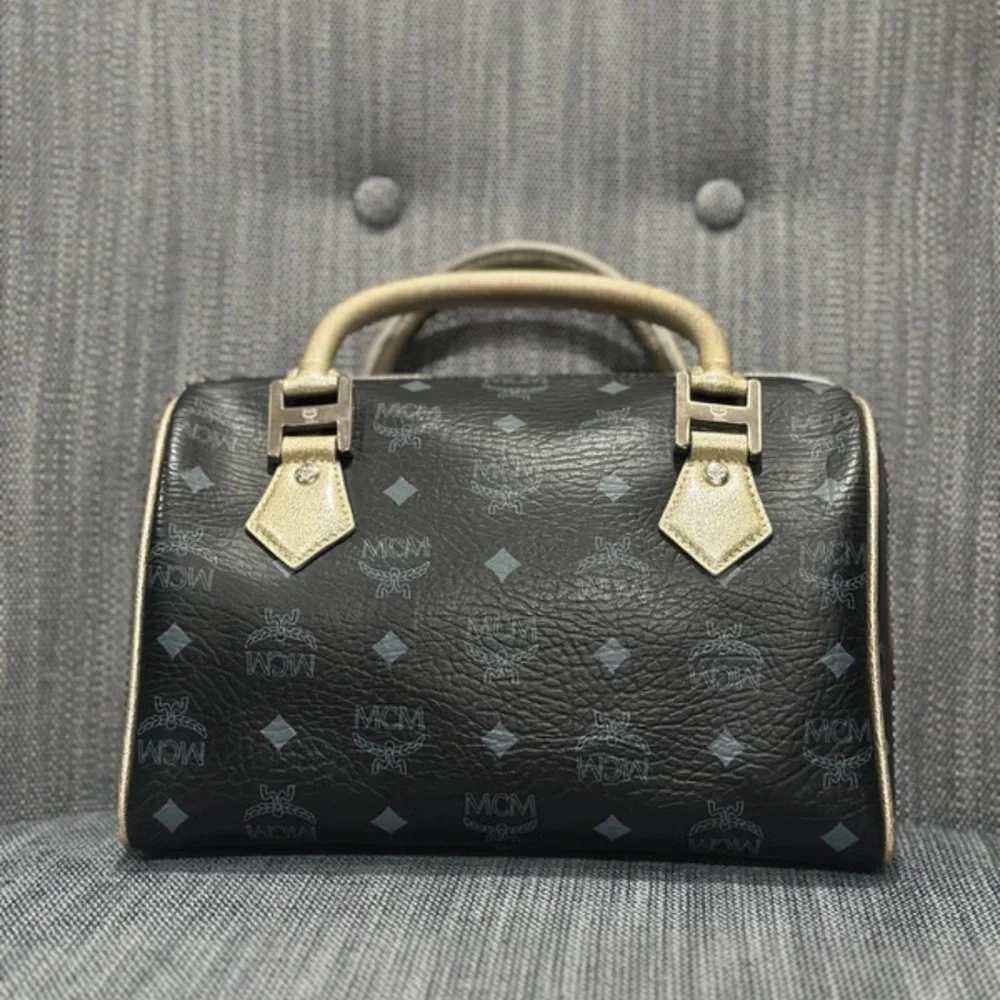 MCM Lion Visetos Boston Satchel Black Gold Leather Bag